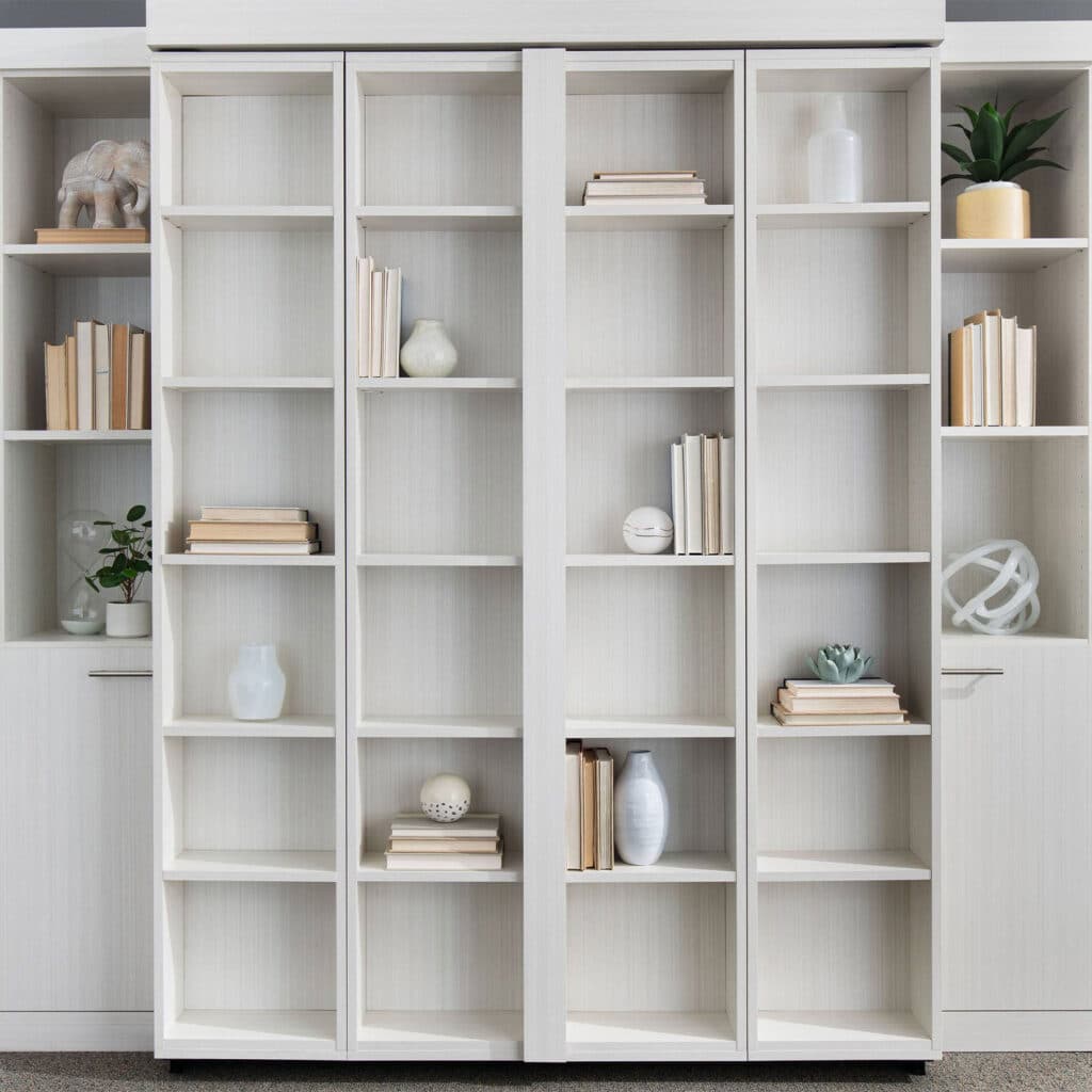 A Murphy bed with shelving is a great way to add storage to any room.