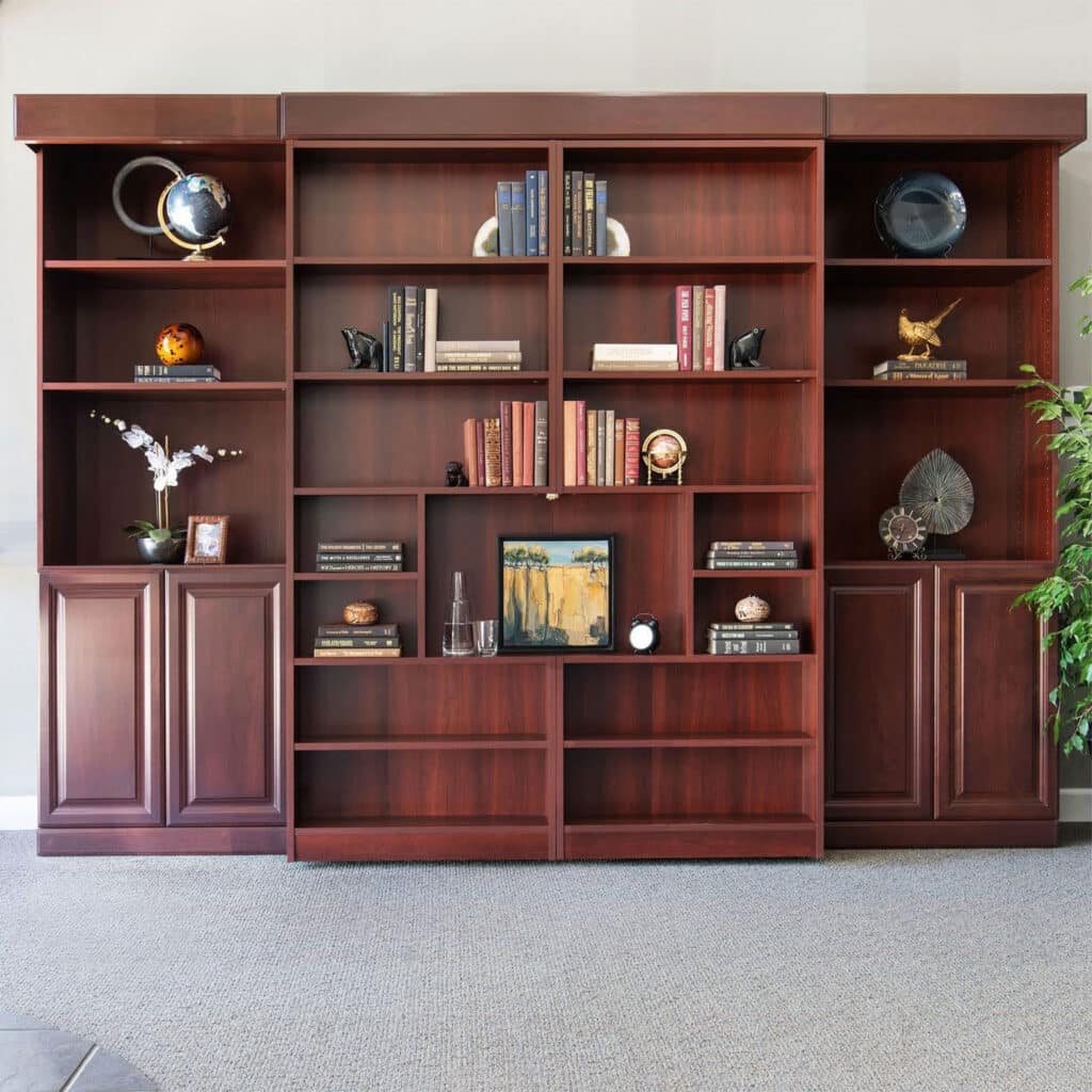 Built-in shelves resembling a bookcase hide a Murphy bed when unused. Visit our Austin or San Antonio Murphy bed showrooms to learn more.
