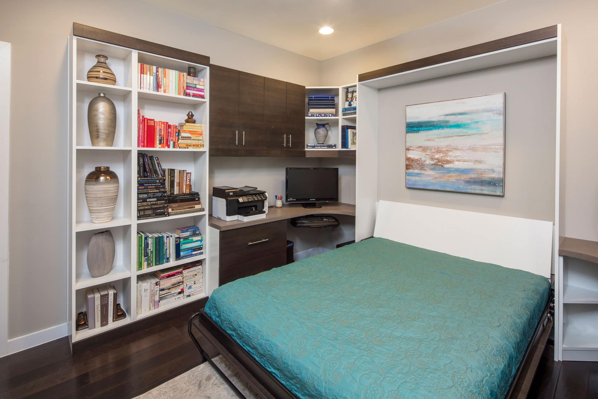 A Murphy bed for office space allows you to hide the bed during the day while the space is a functioning office and easily pull down the wall bed for nighttime use. Learn more about Murphy bed with desk options.